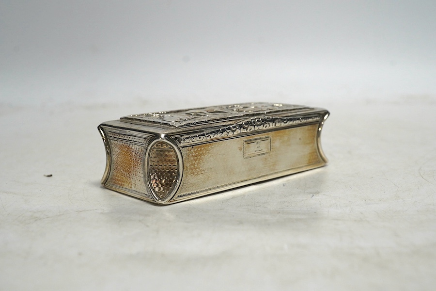 A George IV silver engine turned presentation snuff box, by John Jones III, London 1826, the cover decorated with a scene of deer, the interior with engraved inscription to Lieutenant Borthwick 12th Regiment, 10cm wide,